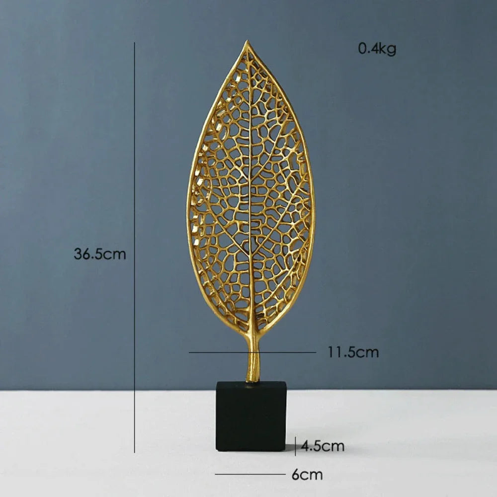 Golden metal leaf tabletop sculpture, intricate details, gold finish - House of Avana