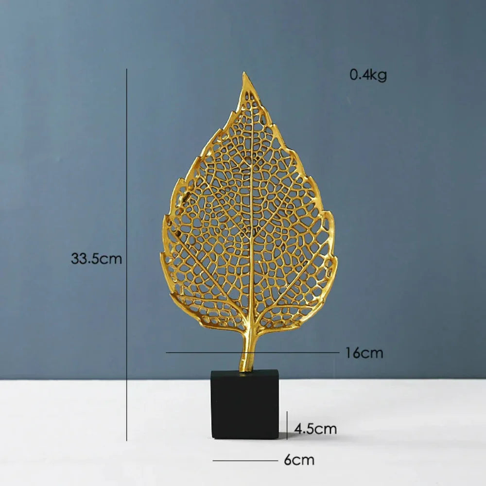Golden metal leaf tabletop sculpture, intricate details, gold finish - House of Avana