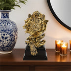 Golden lion figurine, metallic gold finish, majestic king pose - House of Avana