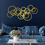 Golden metal wall art, interlocking circles, modern minimalist design - House of Avana