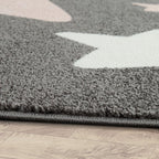 Nursery Rug for Kids in Grey with Pink White Pastel Stars, back view - House Of Avana