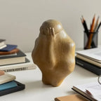 Brown hand-carved wood figure trapped in glass, unique decor - House of Avana