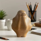 Brown hand-carved wood figure trapped in glass, unique decor - House of Avana