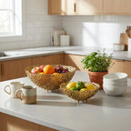 Kitchen counter with 2 golden bronze fruit bowls