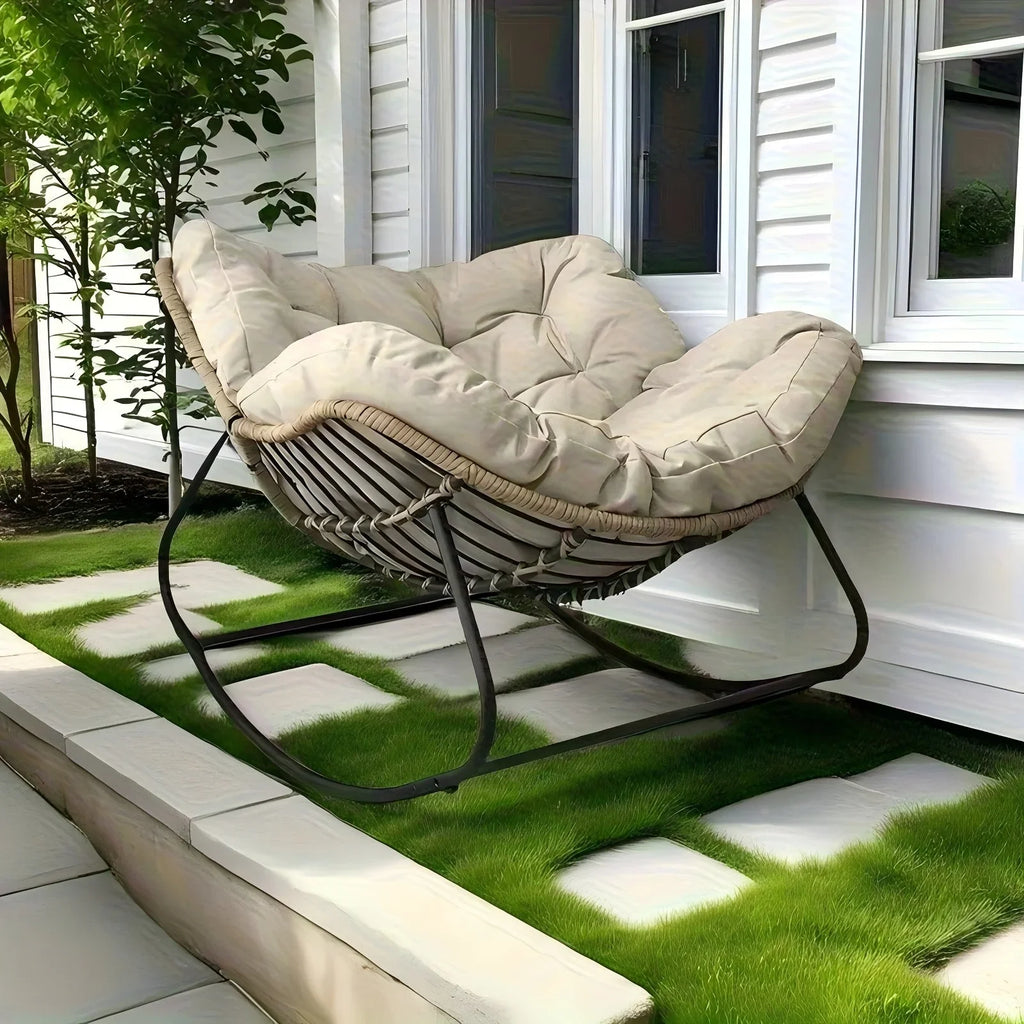 Brown rattan outdoor sofa with beige weather-resistant cushions - House of Avana