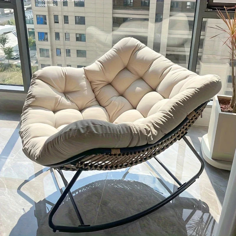 Brown rattan outdoor sofa with beige weather-resistant cushions - House of Avana