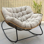 Brown rattan outdoor sofa with beige weather-resistant cushions - House of Avana