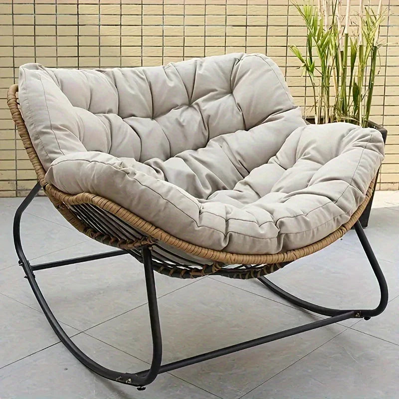 Brown rattan outdoor sofa with beige weather-resistant cushions - House of Avana