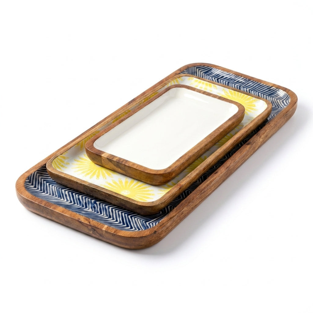 Wooden trays with decorative patterns on a white background