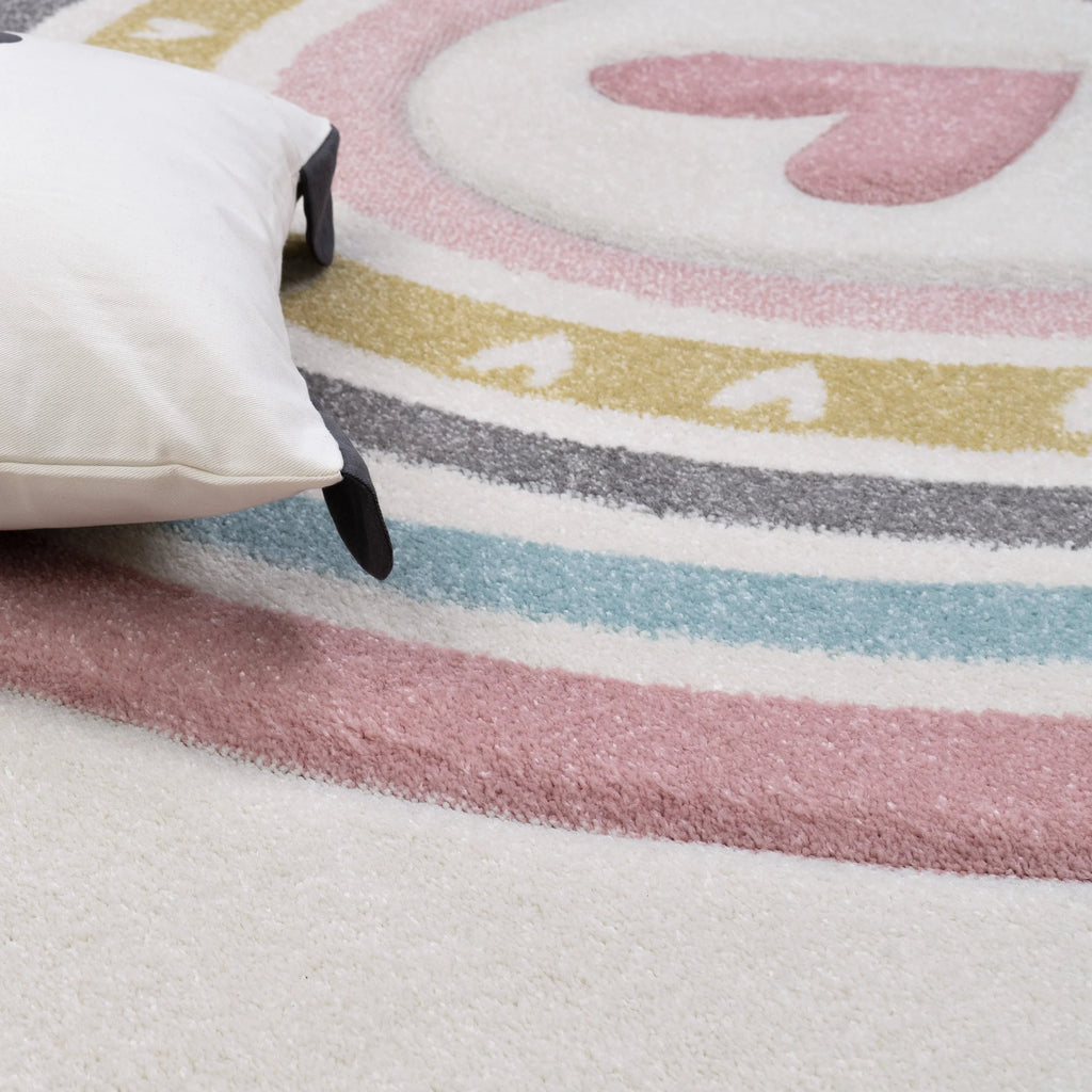 Kids Rug Cosmo with Rainbow & Hearts in Cream, angled view - House Of Avana