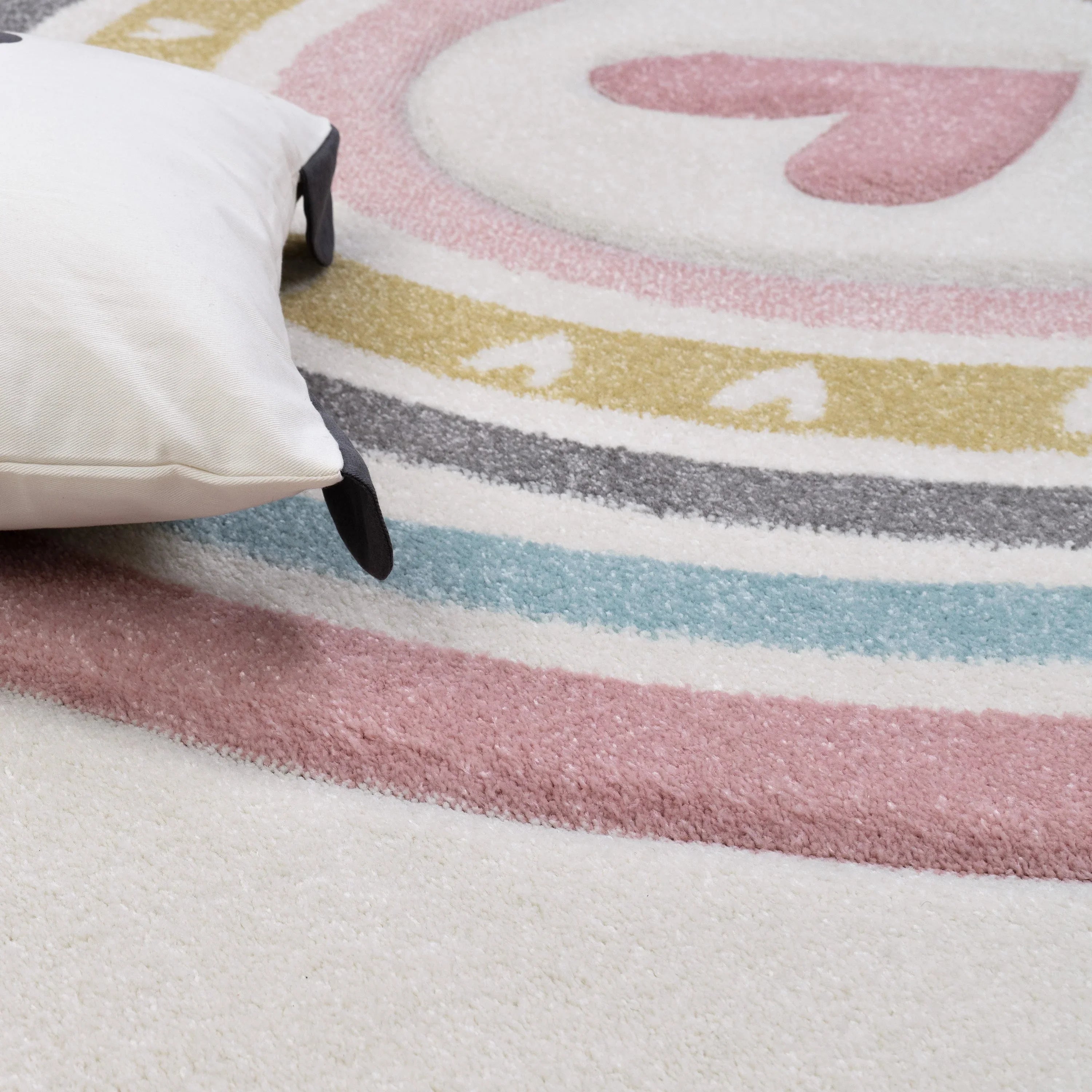 Kids Rug Cosmo with Rainbow & Hearts in Cream, angled view - House Of Avana