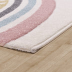 Kids Rug Cosmo with Rainbow & Hearts in Cream, angled view - House Of Avana