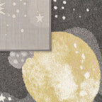 Kids Rug Nino Space with Pastel Colored Planets Stars in Anthracite, detail shot - House Of Avana