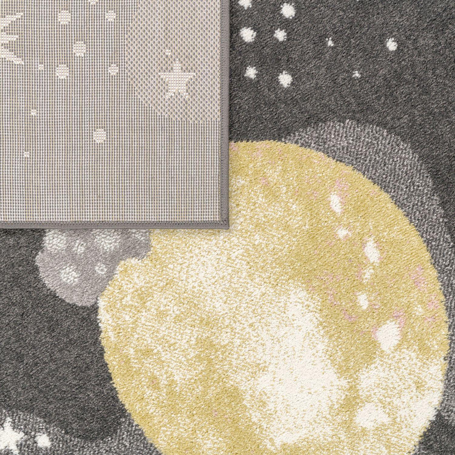 Kids Rug Nino Space with Pastel Colored Planets Stars in Anthracite, detail shot - House Of Avana