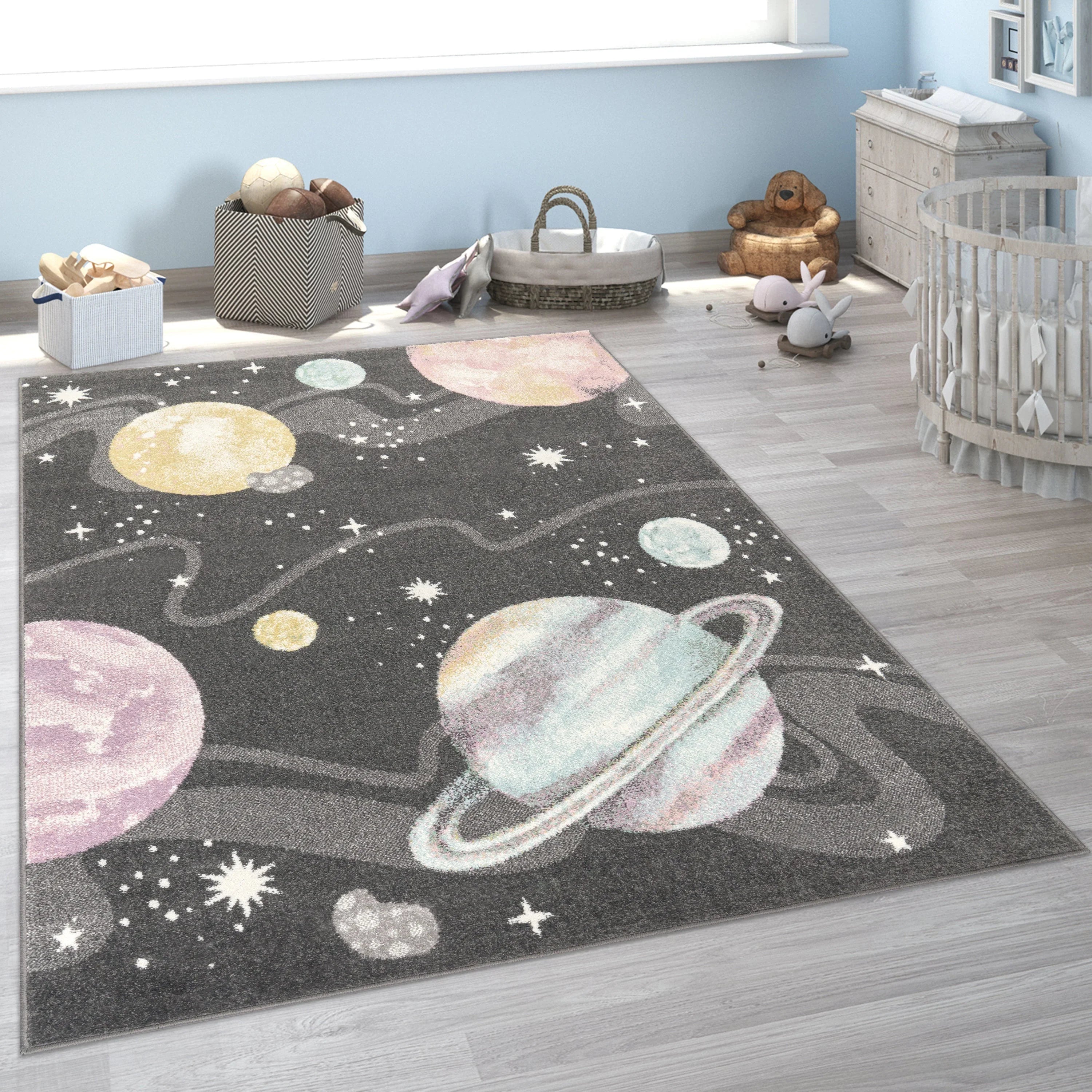 Kids Rug Nino Space with Pastel Colored Planets Stars in Anthracite, lifestyle image - House Of Avana