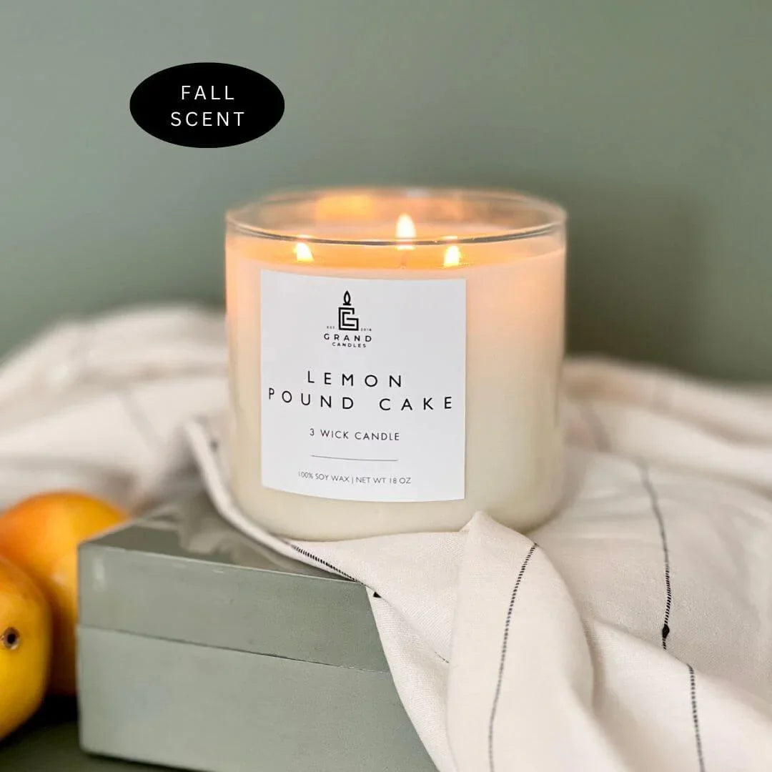 White ceramic candle with sweet lemon scent, soft glow - House of Avana