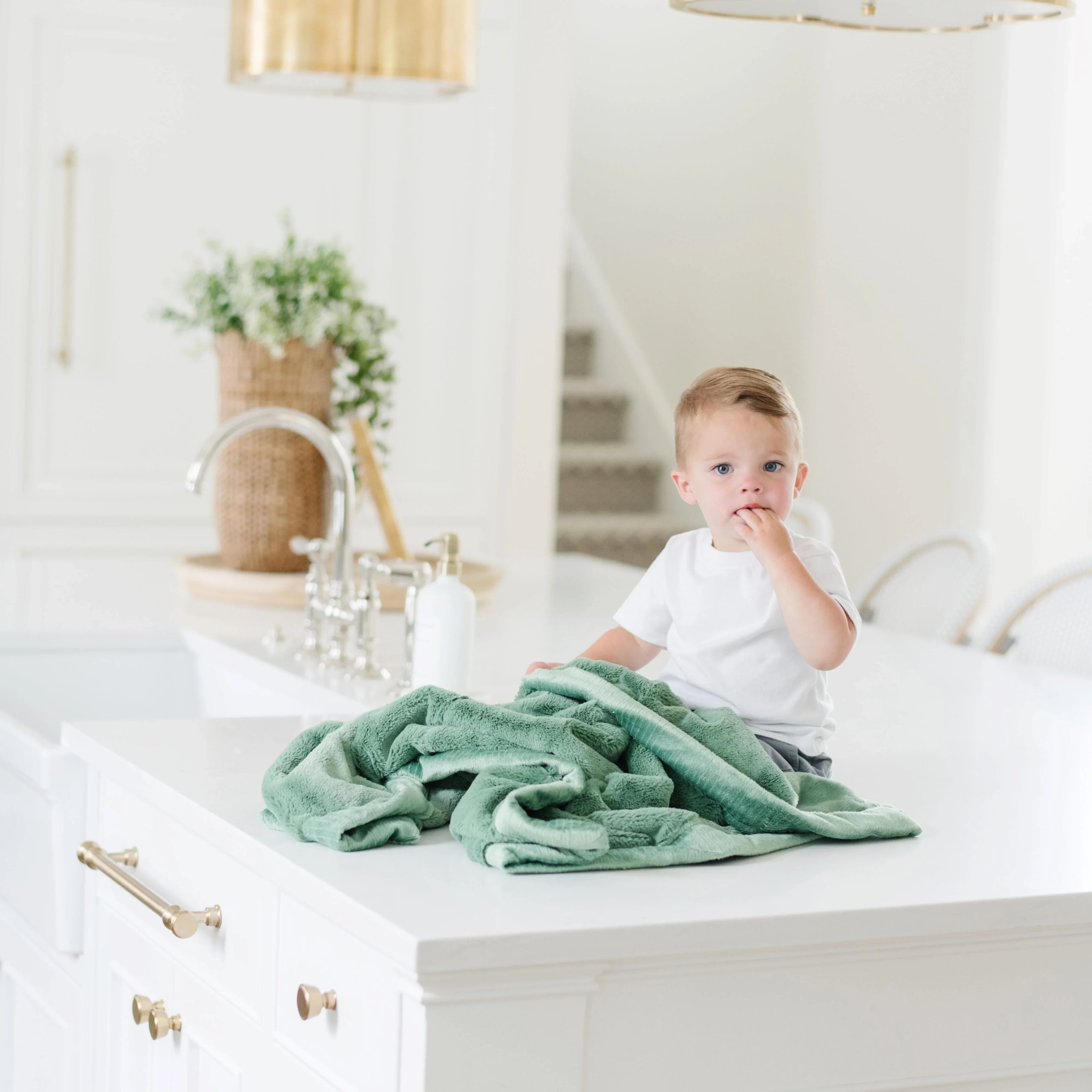 Soft beige receiving blankets, plush texture, gentle fringe detail - House of Avana