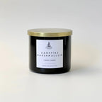 White ceramic candle with golden lid, soft glow Campfire Marshmallow scent - House of Avana