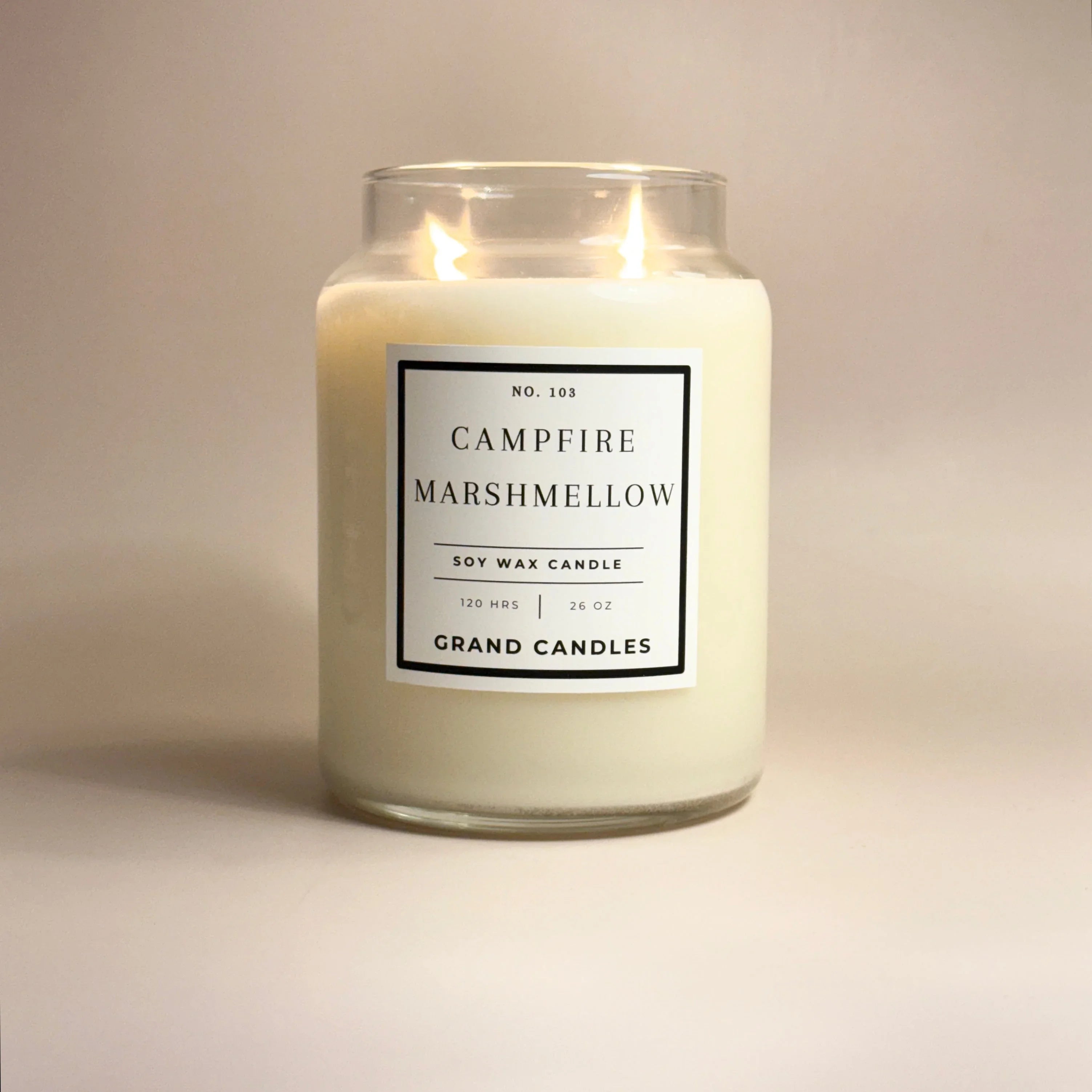 White ceramic candle with golden lid, soft glow Campfire Marshmallow scent - House of Avana