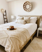 Soft beige Maya throw blanket, woven natural fibers, textured pattern - House of Avana