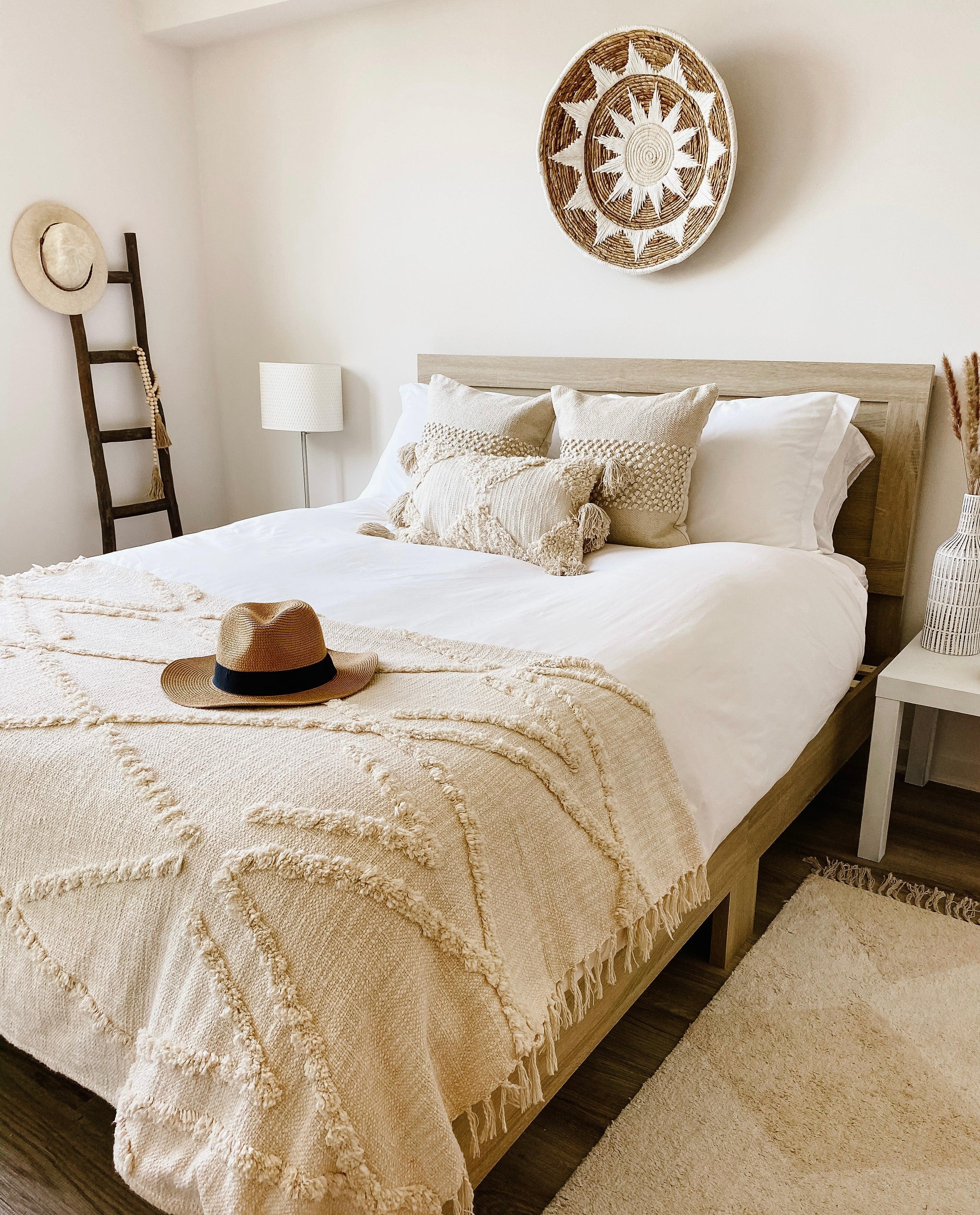 Soft beige Maya throw blanket, woven natural fibers, textured pattern - House of Avana