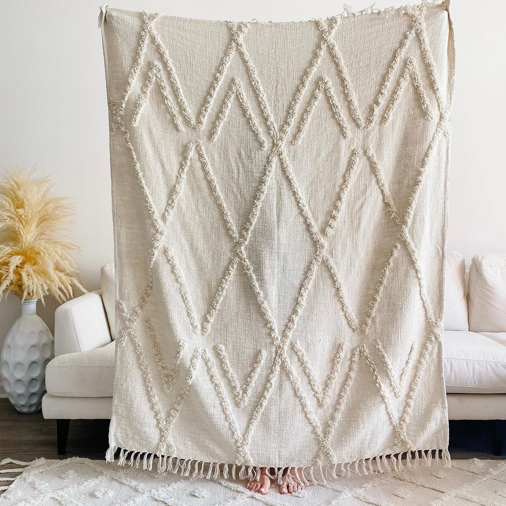 Soft beige Maya throw blanket, woven natural fibers, textured pattern - House of Avana