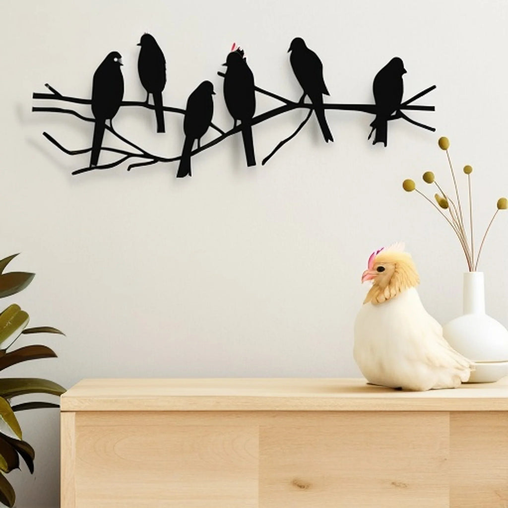 Metal birds on a tree branch, handcrafted in gold tone metal, perched on a wooden limb - House of Avana