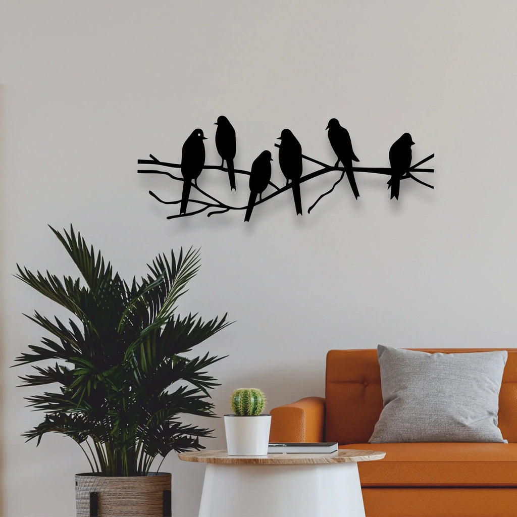 Metal birds on a tree branch, handcrafted in gold tone metal, perched on a wooden limb - House of Avana