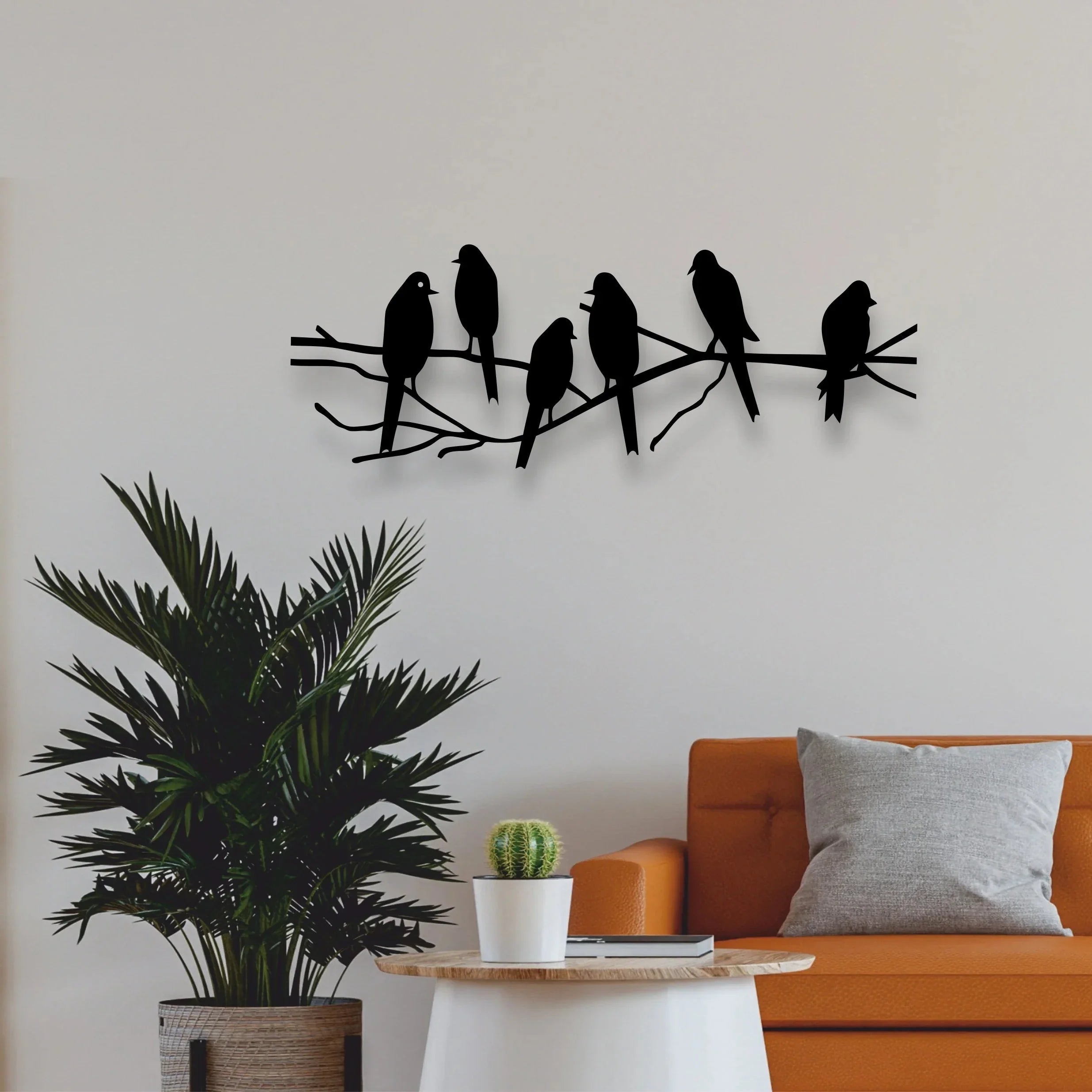 Metal birds on a tree branch, handcrafted in gold tone metal, perched on a wooden limb - House of Avana