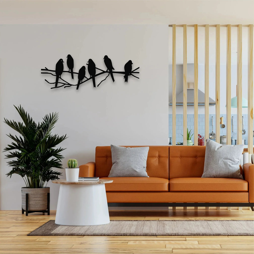 Metal birds on a tree branch, handcrafted in gold tone metal, perched on a wooden limb - House of Avana