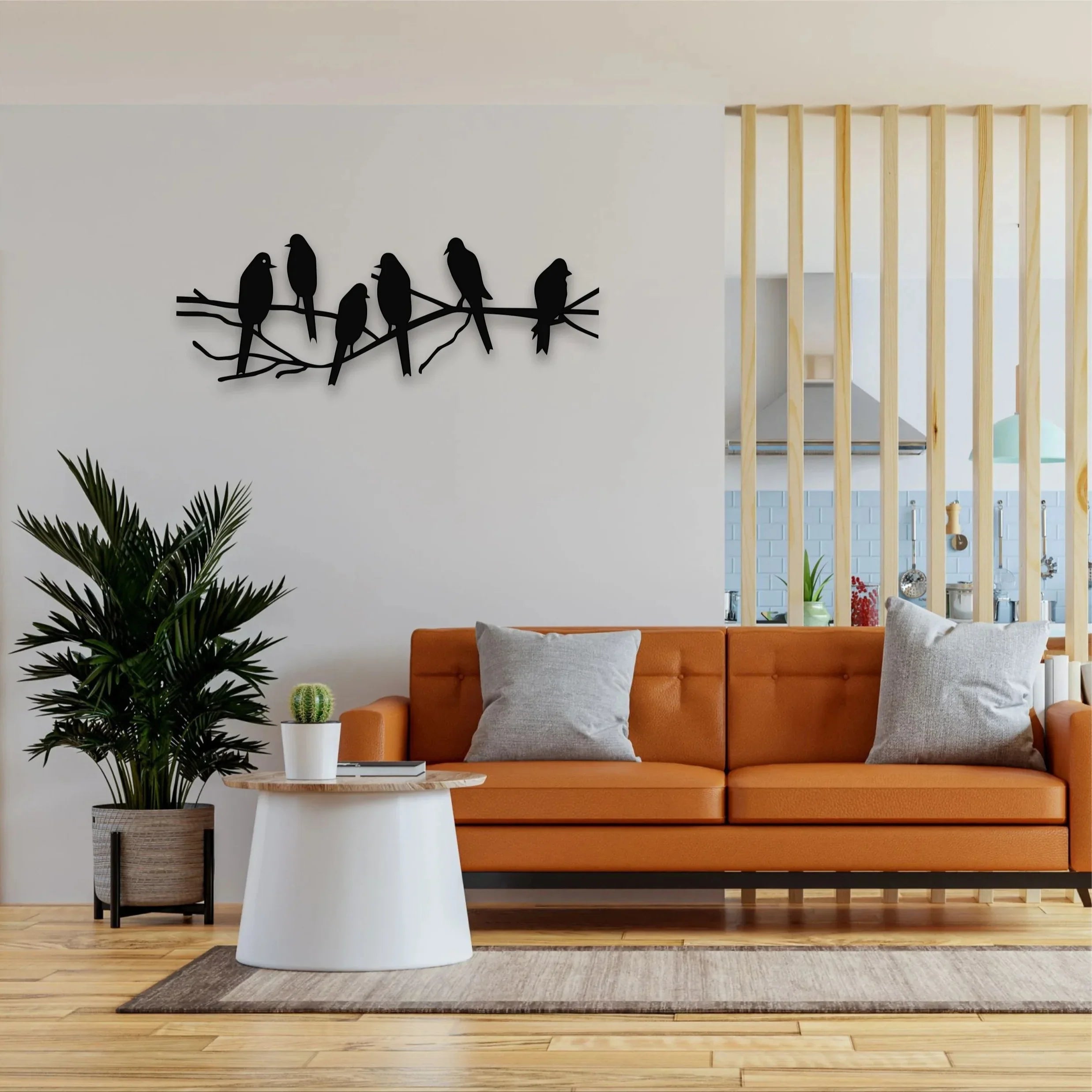 Metal birds on a tree branch, handcrafted in gold tone metal, perched on a wooden limb - House of Avana