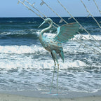 Metal crane sculpture in silver finish, intricate design - House of Avana