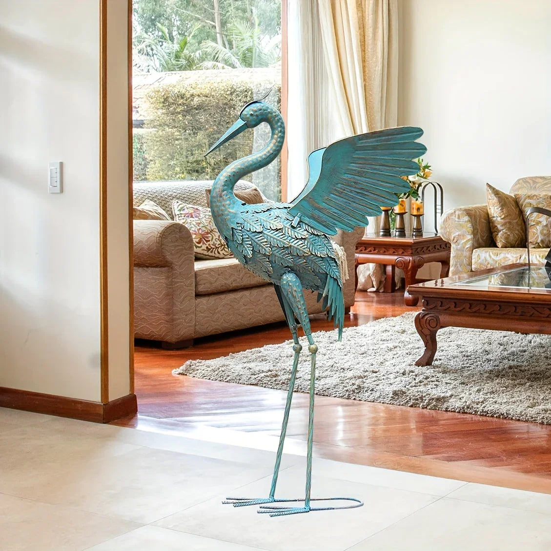 Metal crane sculpture in silver finish, intricate design - House of Avana