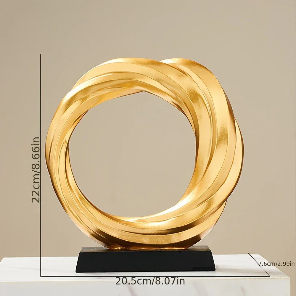 Golden metal circle sculpture, modern abstract design - House of Avana