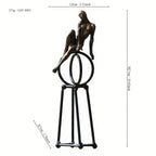 Abstract iron figure sculpture in metallic tones, elegant modern design - House of Avana