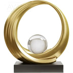 Crystal ball sculpture with golden base, modern abstract décor - House of Avana
