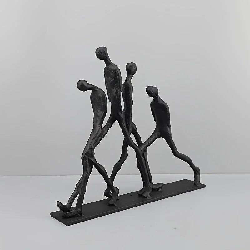 Modern Metal Sculpture - Minimalist Ascending Figures, angled view - House Of Avana