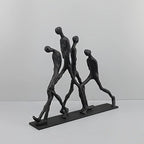 Modern Metal Sculpture - Minimalist Ascending Figures, angled view - House Of Avana