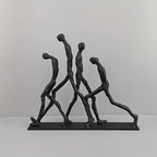 Modern Metal Sculpture - Minimalist Ascending Figures, angled view - House Of Avana