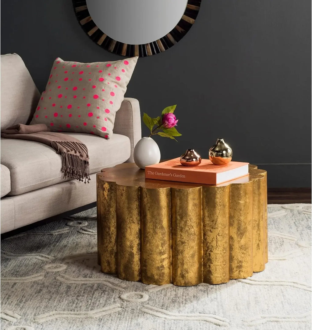 Round gold coffee table, modern metal base, sleek surface - House of Avana