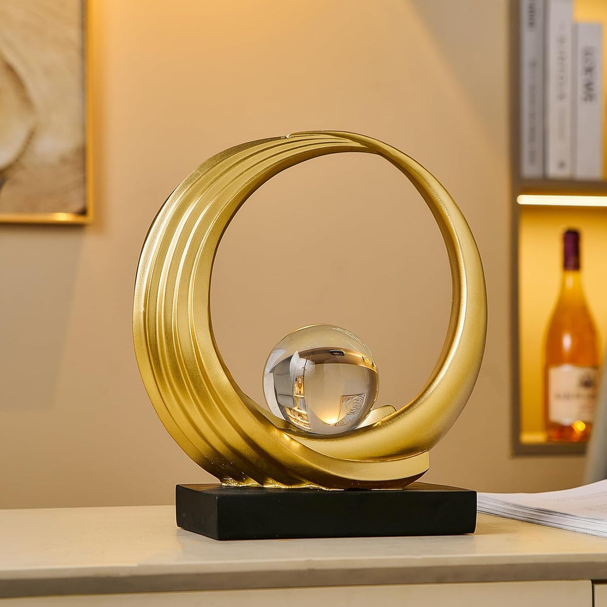 Circle Sculpture with Clear Ball – Gold Resin [[SKU:HOA-SCU-546]]