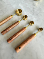 Acacia Wood and Gold Measuring Cups, Set of 8, angled view - House Of Avana