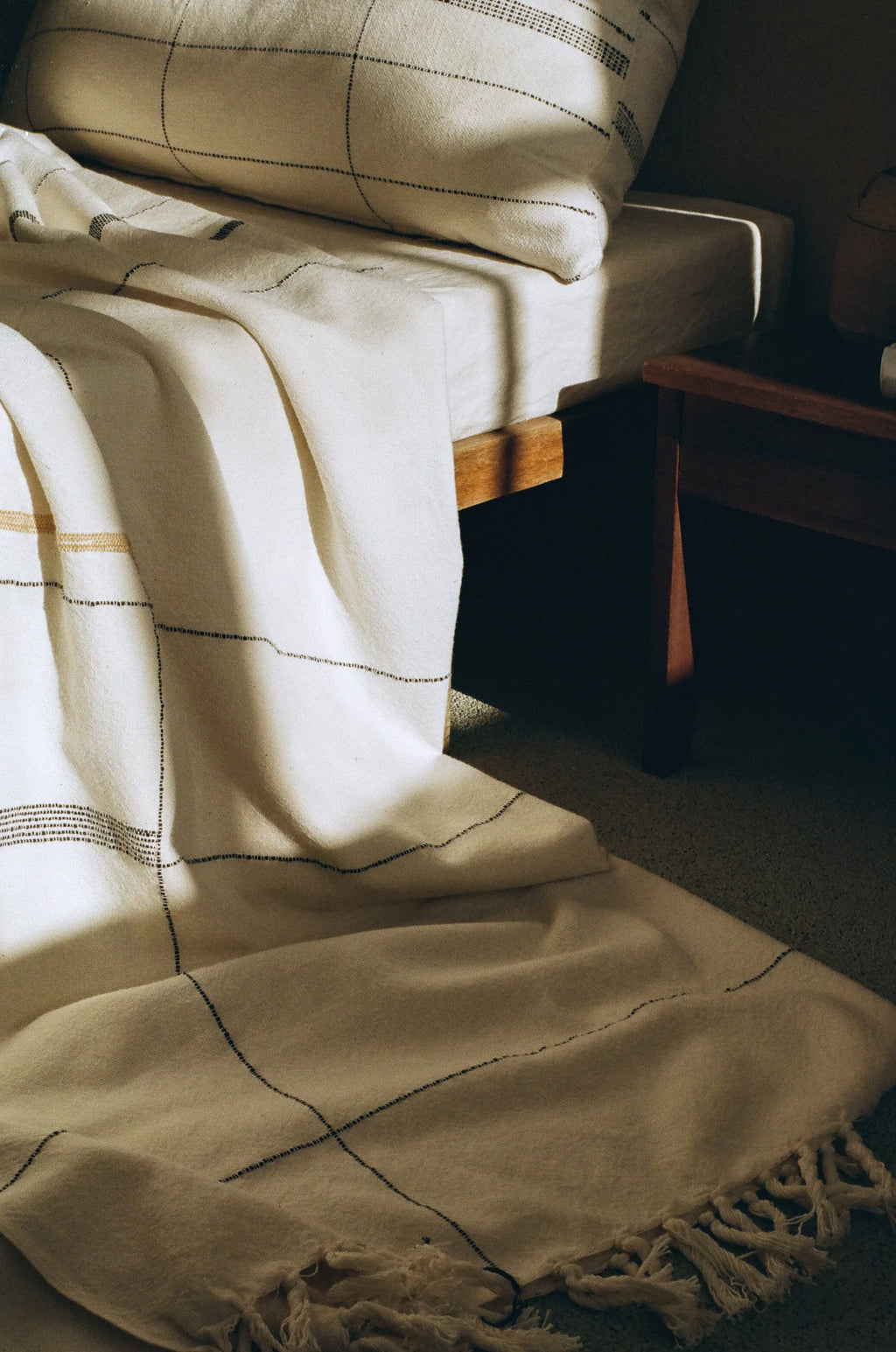 Soft beige cotton throw, hand-loomed texture, natural fibers - House of Avana