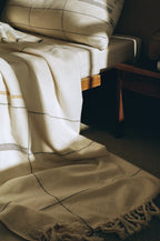 Soft beige cotton throw, hand-loomed texture, natural fibers - House of Avana