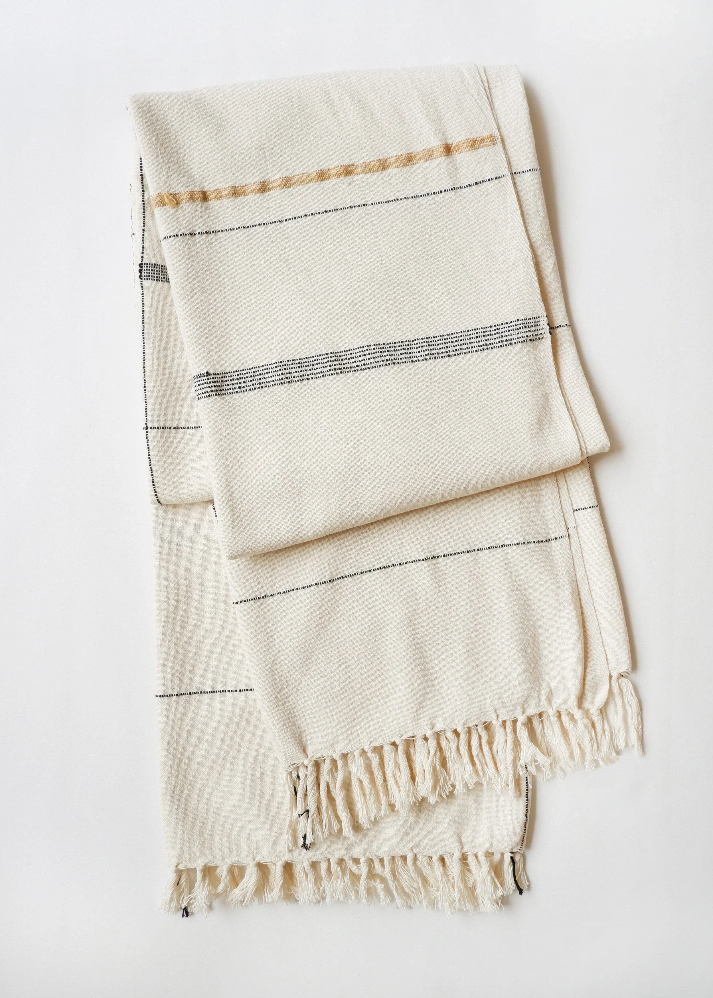 Soft beige cotton throw, hand-loomed texture, natural fibers - House of Avana
