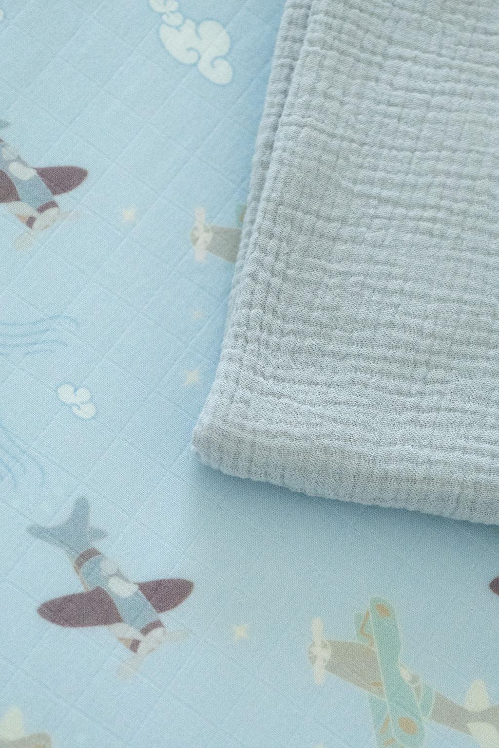 Organic Bamboo Cotton Muslin Crib Sheet in Dreamy Planes Cradle Comforts Co.