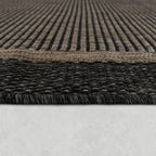 Grey and brown outdoor rug with rustic border, woven design - House of Avana