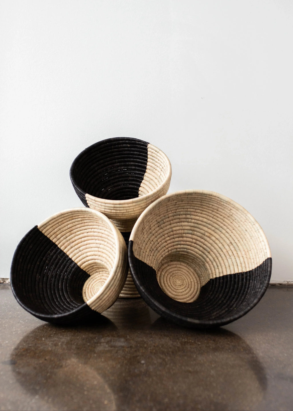 Pedestal Black and Natural Basket Bowl Kanju Interiors