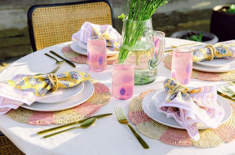 Pinwheel Pink Placemat, raffia tabletop Payton James