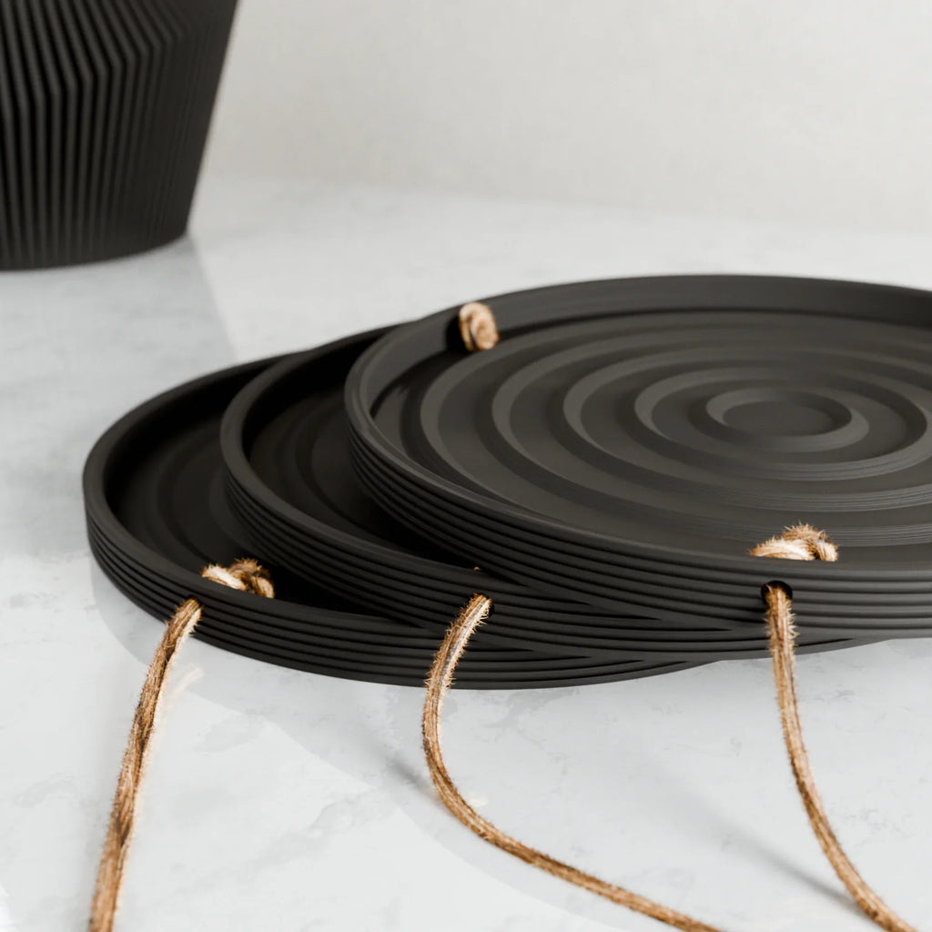 Hanging Plant Pot Tray | Puddle, angled view - House Of Avana